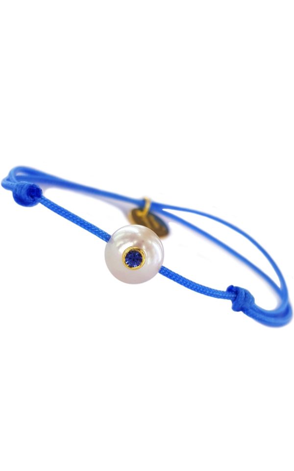 Bracelet bébés et enfants perle de culture d'Akoya incrustée d'un saphir bleu - JDL Paris - bijou original pour enfant