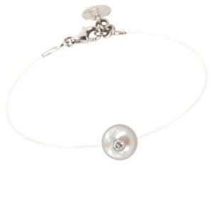 Bracelet JDL Paris - perle blanche avec diamant sur fil transparent