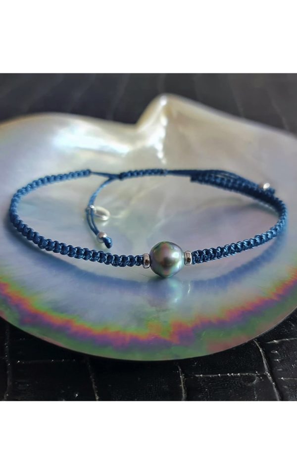 Bracelet bleu avec perle de Tahiti cerclée