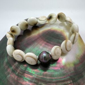 Bracelet perle de Tahiti cerclée et oeil de sainte Lucie - JDL Paris